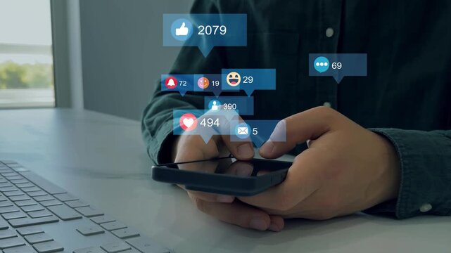 Social media,marketing, like,social network,blog,live,chat reaction and livestream.	Man using smart phone with emoticon icons of Social Media.Interactive with friends on chat with emoticon feedback.