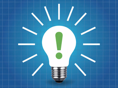 Innovative idea light bulb with green exclamation mark symbol