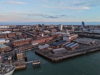 Fototapeta premium Portsmouth historic naval dockyard UK drone,aerial Goleden hour