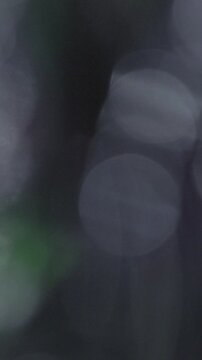 Macro Vertical Flashing Light Bokeh Transition, Bright Abstract Light Motion In Close Up Frame. ideal for product teaser
