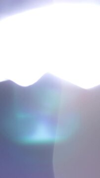 Lens Vertical Flashing Light Bokeh Transition, Bright Light Abstract Motion with Lens Flare. ideal for creative edit