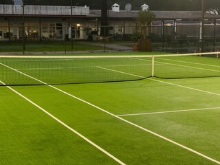 Obraz premium Green tennis court that is empty