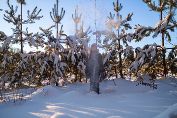 Little Girl Exploring Snow During Winter Walk