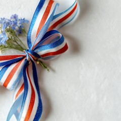 A patriotic ribbon bow with flowers celebrating Memorial Day
