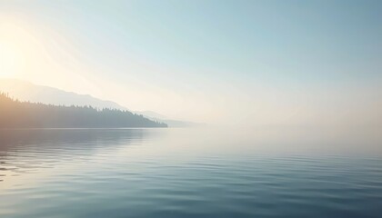 Fototapeta premium A serene landscape at dawn with calm water reflecting soft pastel hues, surrounded by hazy mountains.