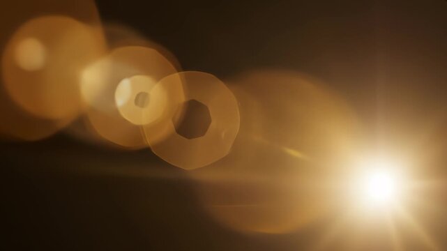 Real Shooted Cinematic Lens Flare Overlay on Black Background.