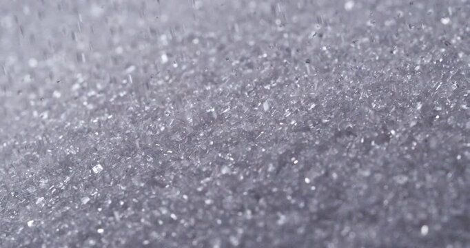 Slow Motion Of White Sugar Falling  Cascade. Crystal Macro Texture Background Concept Of Sweetness And Food Industry