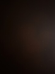Fototapeta premium Starry Night Sky with Bright Stars and Gradual Glow - Dark Background with Celestial Bodies