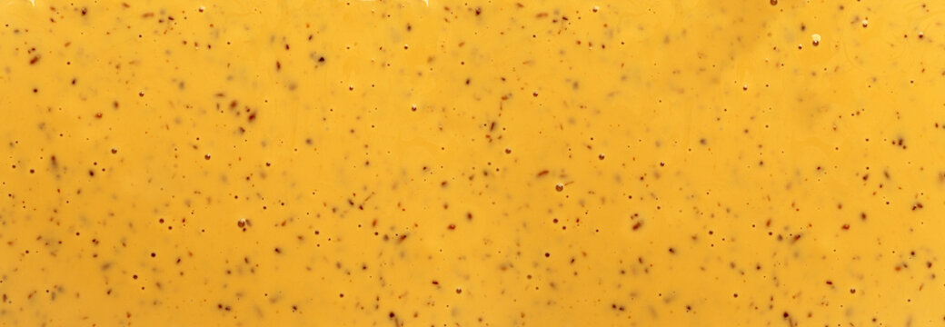 Honey mustard sauce texture creating food background