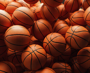 Obraz premium Background of Many Orange Basketballs Piled Together for Sports and Fitness Concept