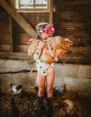 Little girl and her chicken © Mac