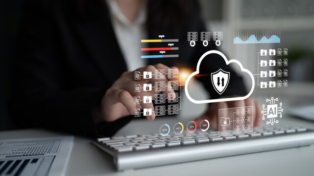 A business professional engages with advanced digital cloud technology while using a keyboard, representing modern cybersecurity and data management solutions in a professional workspace. Gantry