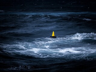 Yellow buoy enduring stormy weather with dark clouds