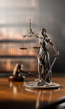 Legal Concept: Themis is the goddess of justice and the judge's gavel hammer as a symbol of law and order on the background of books