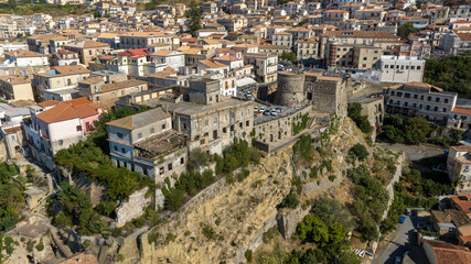 Obraz premium Aerial view of Pizzo Castle is located in the center of Pizzo Calabro, a town in Calabria in the province of Vibo Valentia, Italy. It is also known as Murat Castle, can be visited and houses a museum.