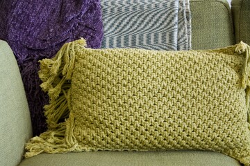 pillow and blankets on the sofa