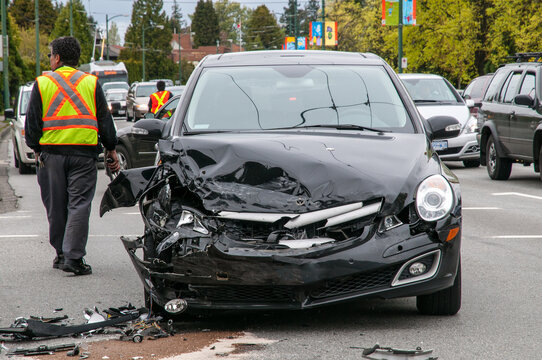 Canada, BC, Vancouver.  Motor vehicle accident, 64th Avenue at Oak Street.