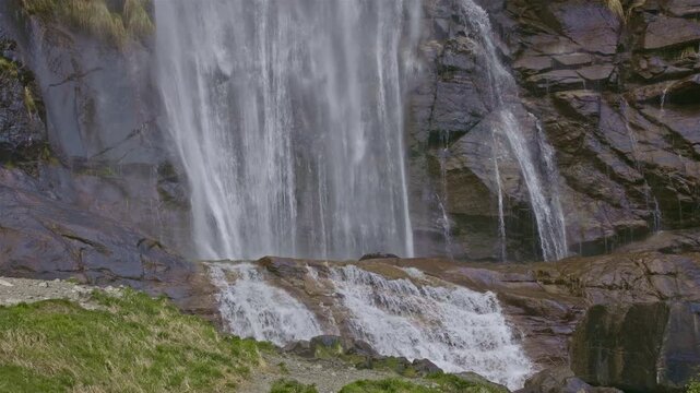 Twin waterfalls that plunge into the valley, Acquafraggia waterfall, Borgonuovo, Lombardy, Italy.