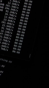 Data transfer. Dark screen with command-line outputs listing files and system directories in structured columns.