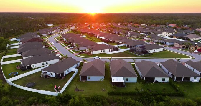 Suburban houses in rural residential area in American city outskirts.