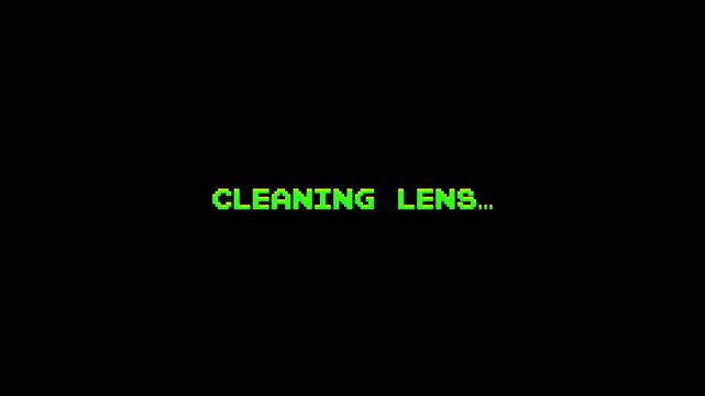 Retro 8 Bit Pixel Text "Cleaning Lens..." Glitch Message Loading Screen Animation 4k video animation seamless loop