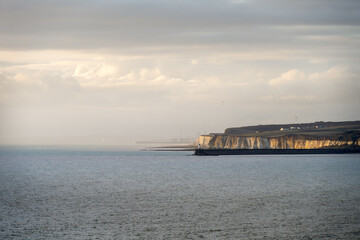 Obraz premium View of the chalk cliffs of Newhaven and Newhaven habour in winter, East Sussex, England