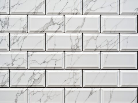 White marble look subway tile backsplash pattern