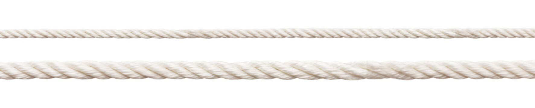 Two parallel thick white cotton ropes lying horizontally showing clear braided texture and varying diameter sizes&nbsp;
