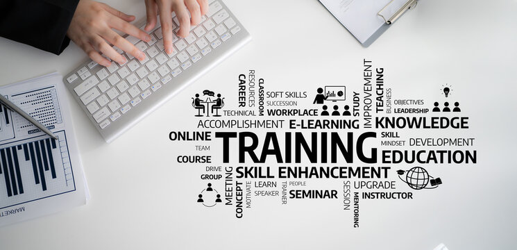 This image captures the essence of business training and education, showcasing a keyboard, charts, and keywords associated with skill enhancement and online learning. Tessel