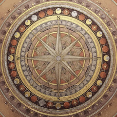 Obraz premium Ornate Compass Rose with Moon Phases and Celestial Elements