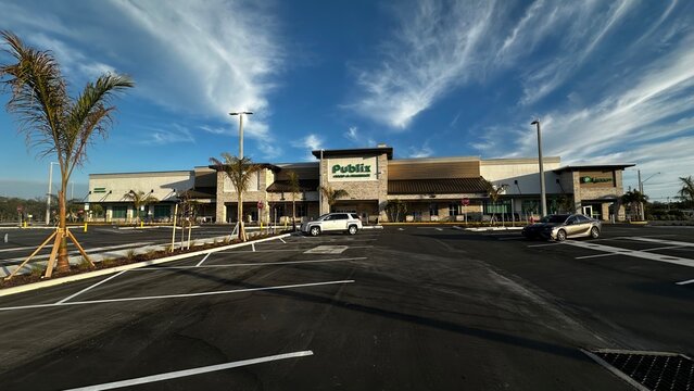 Wide view of new Publix Food and Pharmacy with Publix Liquors and parking lot at 6605 38th Ave N on February 11, 2026 in St. Petersburg, Florida