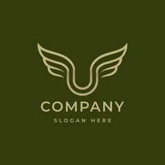Elegant abstract letter U logo with stylized wings, featuring modern typography and a premium corporate brand identity layout.