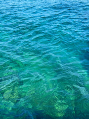 Obraz premium Water sea ocean clear blue surface vertical.