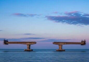 Obraz premium Architectural marvel in progress, bridge construction over tranquil ocean water