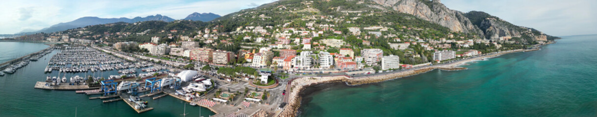 Aerial view of Menton France during winter showing calm Mediterranean coastline and city