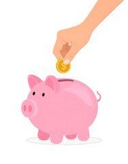 Fototapeta premium A hand putting a coin into a pink piggy bank (1)