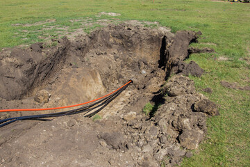 Digging in electrical and communication lines for wind turbines © Peter