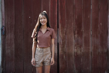 Fototapeta premium Portrait of young Asian woman , An asian chinese female student, Teenage Girl lifestyle