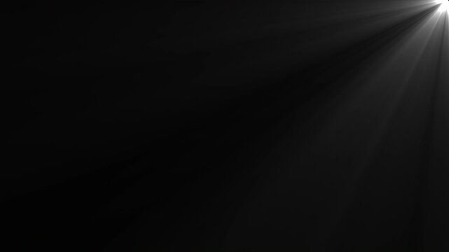 Lens flare light rays optical spotlight projector effect black background overlay suitable for cinematic scenes, transitions, video overlays, and visual effects.