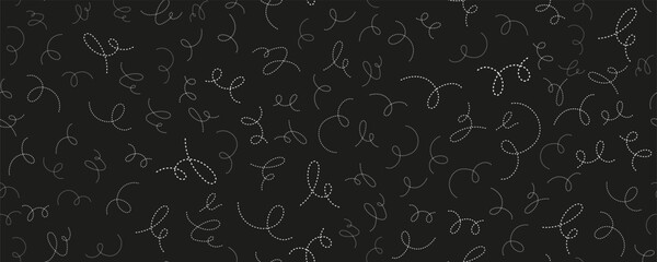 Abstract white dotted curved lines forming playful swirling loops on black background. Seamless decorative pattern with dynamic movement and rhythm.