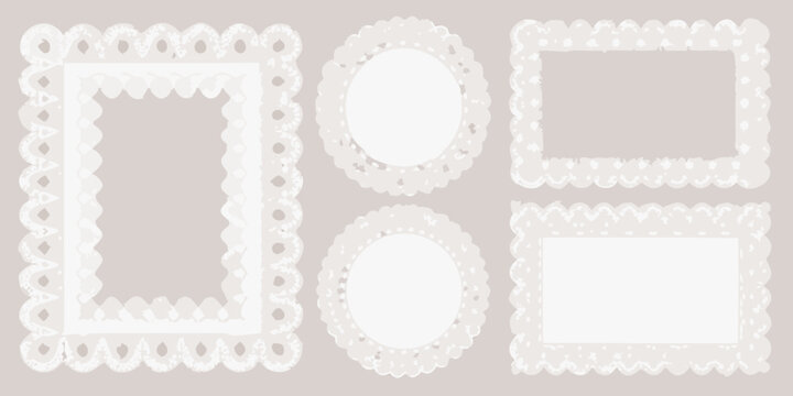 Collection of ornate white lace frames in various shapes and sizes