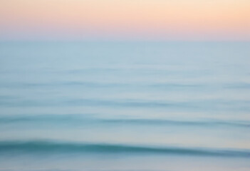 Obraz premium Soft pastel gradient sky at sunrise with smooth horizontal clouds minimalist background abstract calm nature