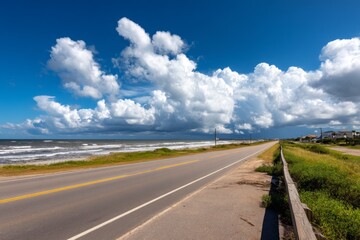 Coastal Road Under Dramatic Clouds with Distant Storm Over the Sea