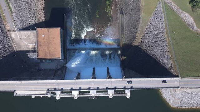 The J. Percy Priest Dam, located on the Stones River near Nashville, Tennessee - aerial, straight down, bird's eye view with the spray forming a rainbow