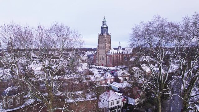 Picturesque winter wonderland medieval Hanseatic Dutch tower town Zutphen in the Netherlands covered in snow