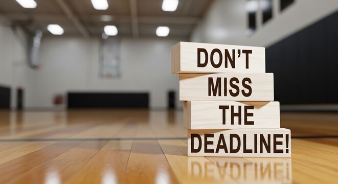 Wooden blocks stacked with the words dont miss the deadline message