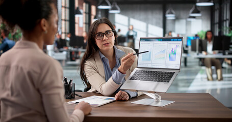 Expert Financial Advisor Assists Diverse Business Client