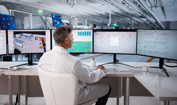 Skilled Operator And Engineer Monitoring SCADA System
