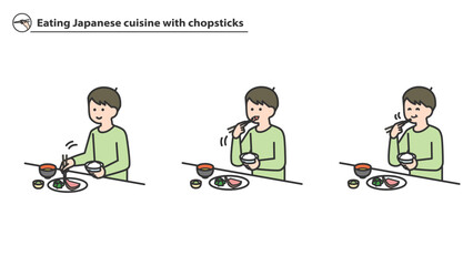 箸で和食を食べる男の子