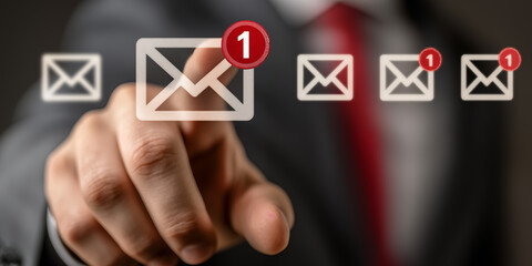 Businessman in dark suit touching virtual email notification icon on transparent digital interface, multiple envelope symbols with red unread badges, modern corporate technology concept
